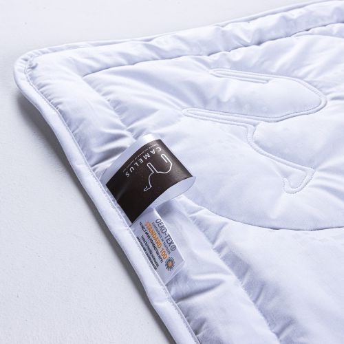 A perfect shower gift. Warm, soft, cozy camel wool filled organic duvet - sized just right for small children. 100% organic and ethically-made. Cuddle up with Camelus.